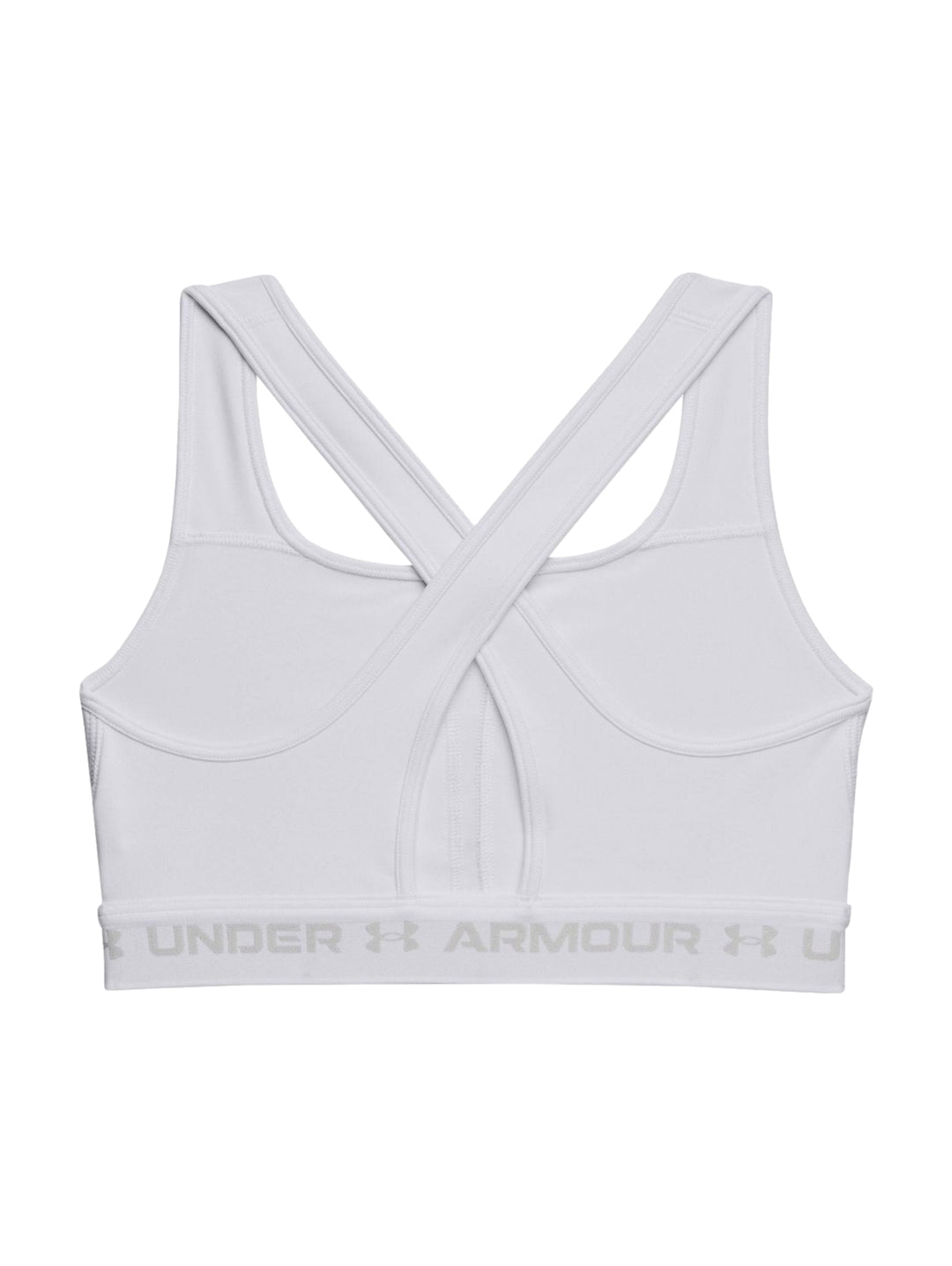 Mujer vistiendo un bra deportivo blanco de Under Armour con banda elástica en la base.