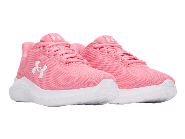 Tenis deportivos Under Armour color rosa con suela blanca y logotipo blanco en el lateral.
