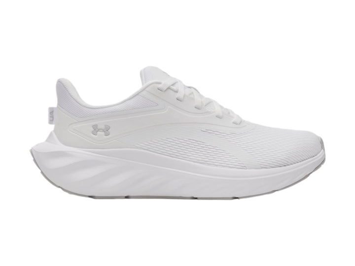 Tenis deportivos Under Armour color blanco con suela blanca y tejido transpirable.