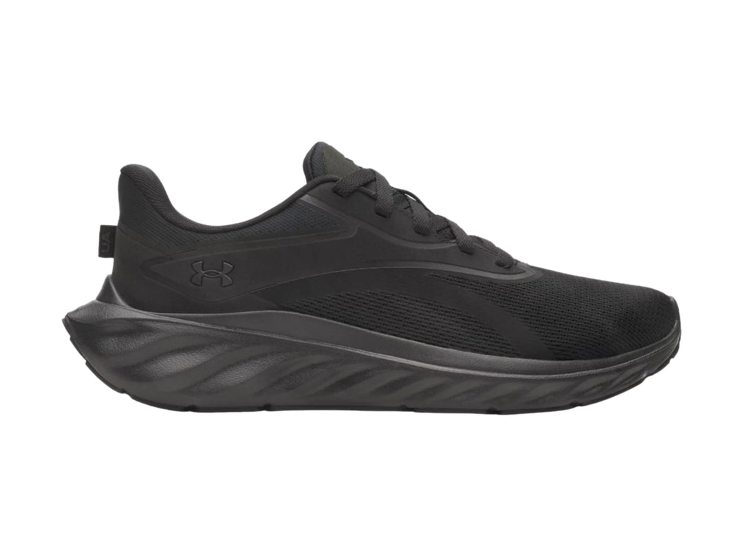 Tenis deportivos Under Armour color negro con malla transpirable y suela gruesa.
