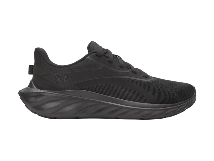 Tenis deportivos Under Armour color negro con malla transpirable y suela gruesa.