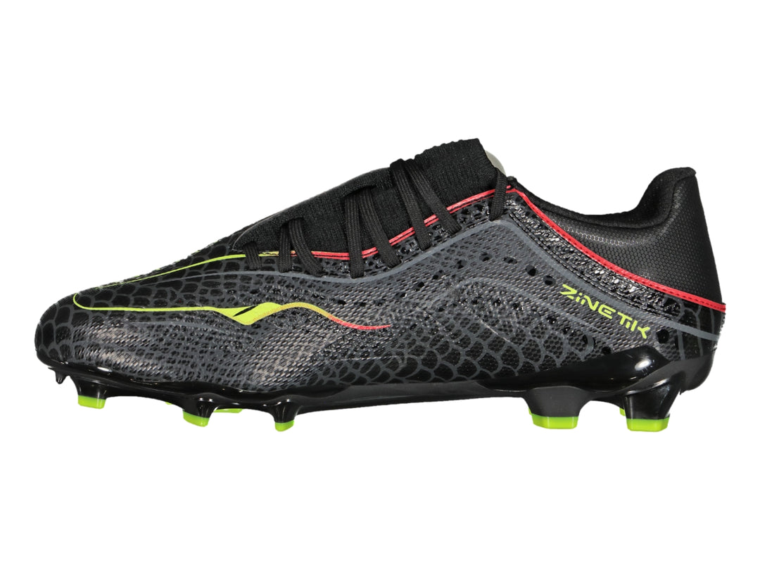 Zapato de fútbol Charly color negro con detalles en amarillo limón y rojo, vista lateral.