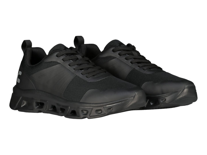 Tenis deportivos Charly color negro con suela robusta y parte superior de malla.
