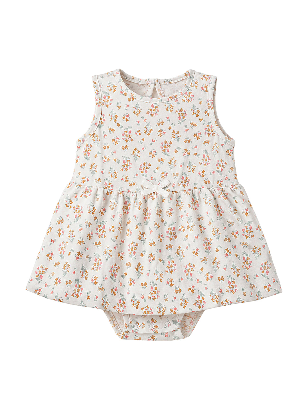 Vestido pañalero color ivory con estampado floral pequeño y moño al frente para niña.