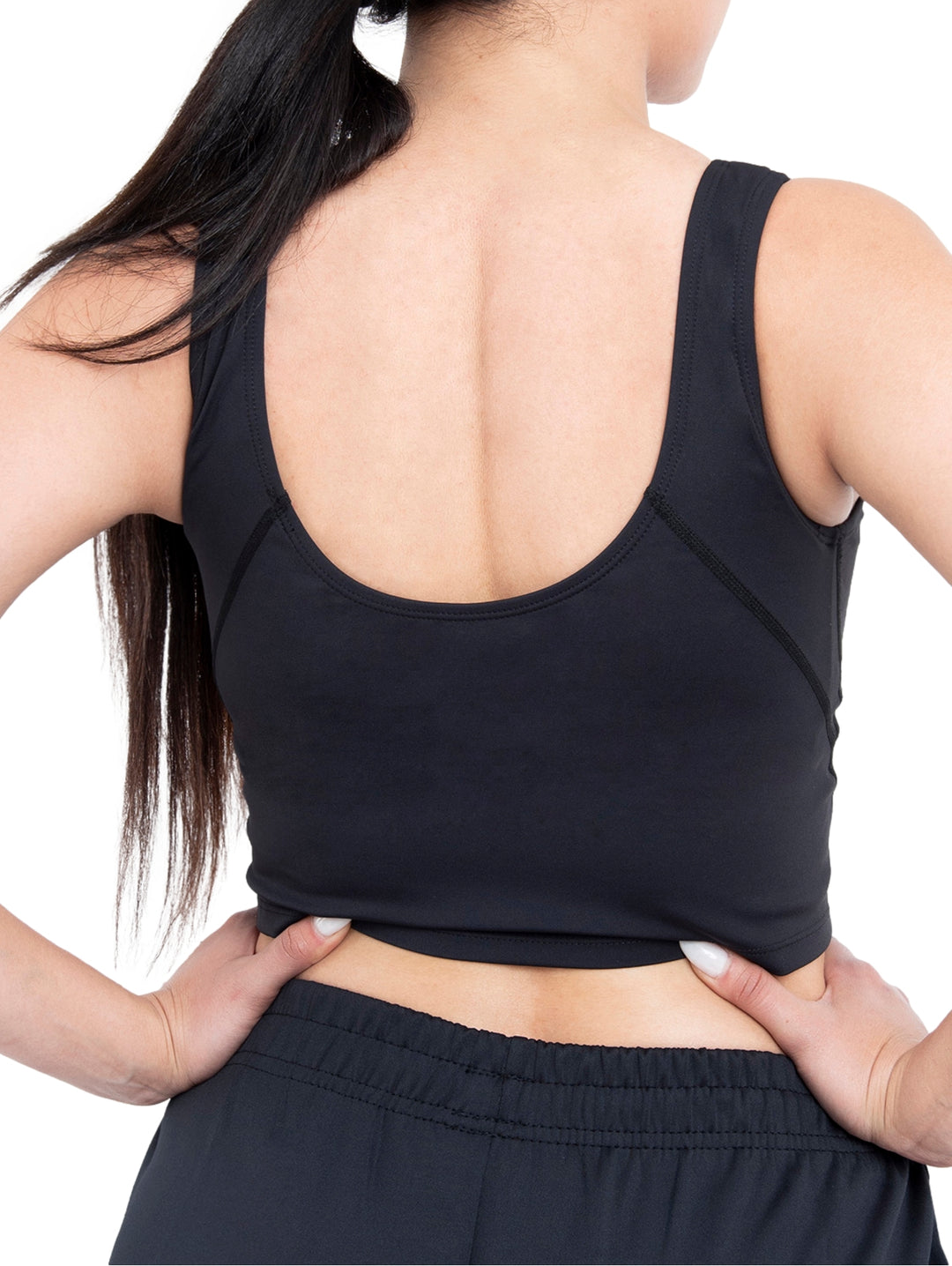 Top deportivo negro de marca Voit para mujer, estilo crop top con cuello redondo.