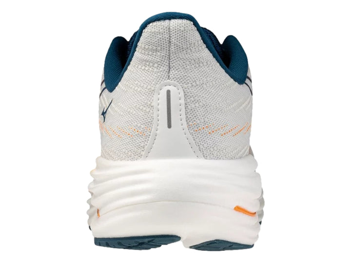 Tenis deportivos Mizuno Wave Rider 29 en color blanco con detalles en naranja y azul.