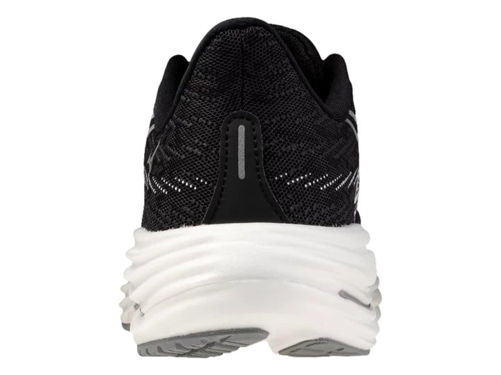 Tenis deportivos Mizuno Wave Rider 29 en color negro con suela blanca y detalles laterales blancos.