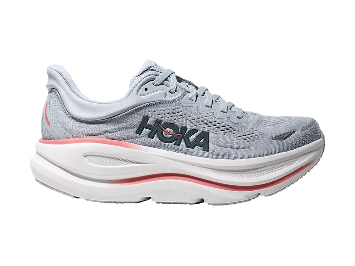Tenis deportivos HOKA Bondi 9 color azul mineral con suela blanca y detalles en coral.