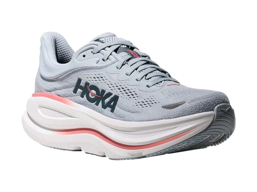 Tenis deportivos HOKA Bondi 9 color azul mineral con suela blanca y detalles en coral.