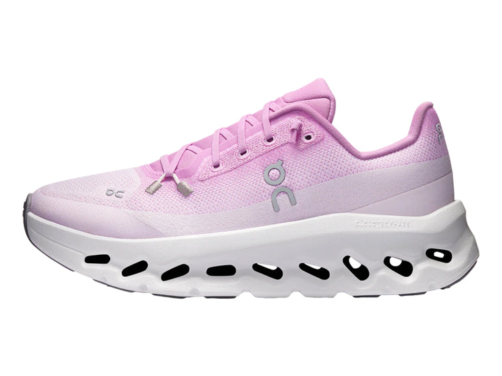 Tenis deportivos On Cloud en color rosa sakura con suela blanca amortiguada.