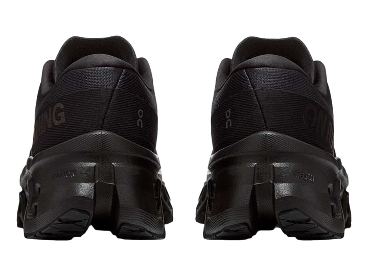 Tenis deportivos On Cloud Cloudmonster 3 color negro para mujer con suela de amortiguación tecnológica.