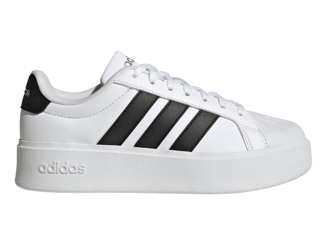 Tenis Adidas Streettalk Bold en color blanco con tres franjas negras laterales y suela de plataforma blanca.