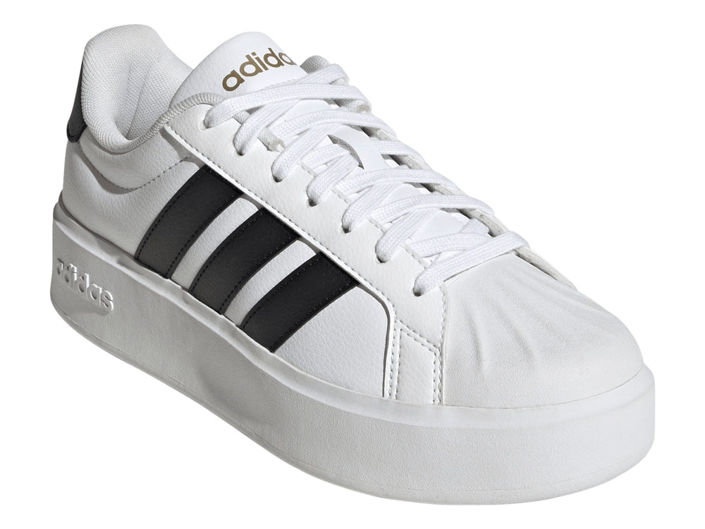 Tenis Adidas Streettalk Bold en color blanco con tres franjas negras laterales y suela de plataforma blanca.