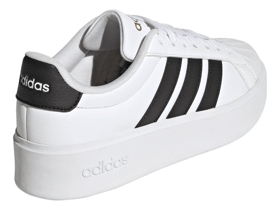 Tenis Adidas Streettalk Bold en color blanco con tres franjas negras laterales y suela de plataforma blanca.