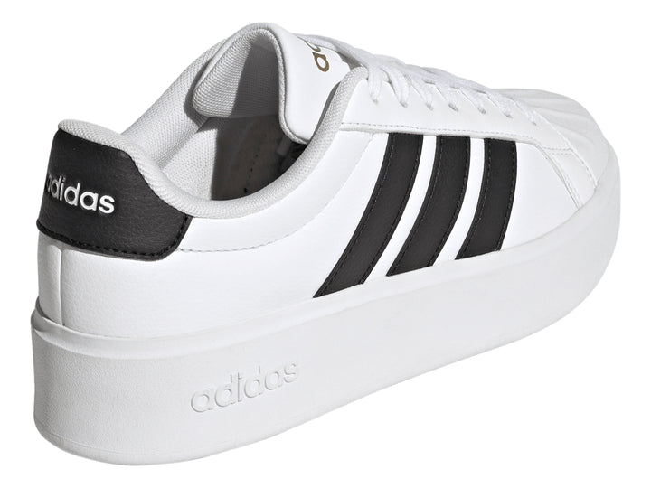 Tenis Adidas Streettalk Bold en color blanco con tres franjas negras laterales y suela de plataforma blanca.