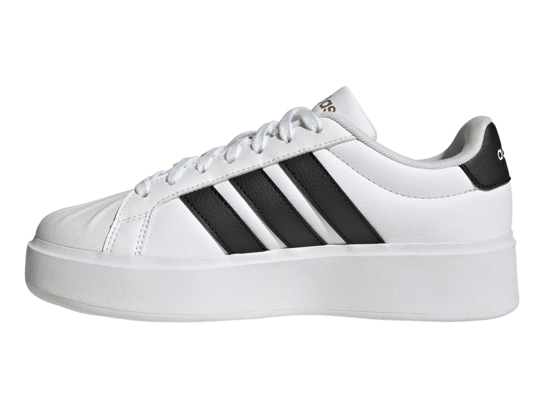 Tenis Adidas Streettalk Bold en color blanco con tres franjas negras laterales y suela de plataforma blanca.