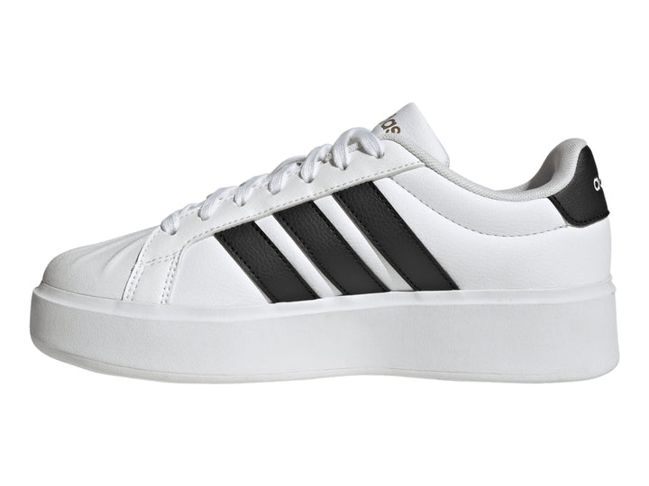 Tenis Adidas Streettalk Bold en color blanco con tres franjas negras laterales y suela de plataforma blanca.