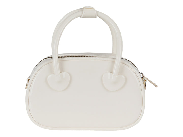 Bolsa de plástico color latte con detalles de corazones y asa superior.