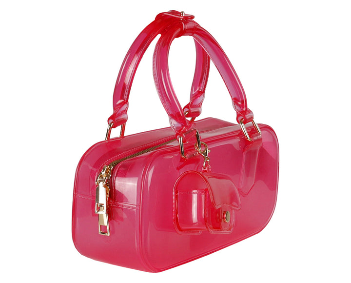 Bolsa de mano transparente color fucsia con detalles dorados y un pequeño monedero adjunto.