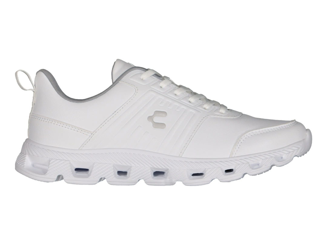 Tenis deportivos Charly color blanco con suela blanca y cordones.