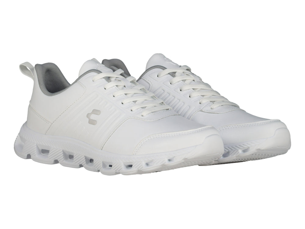 Tenis deportivos Charly color blanco con suela blanca y cordones.