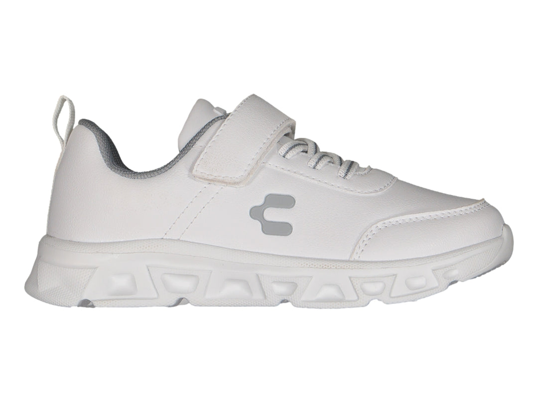 Tenis deportivos Charly color blanco para niño con cierre de velcro y suela blanca robusta.