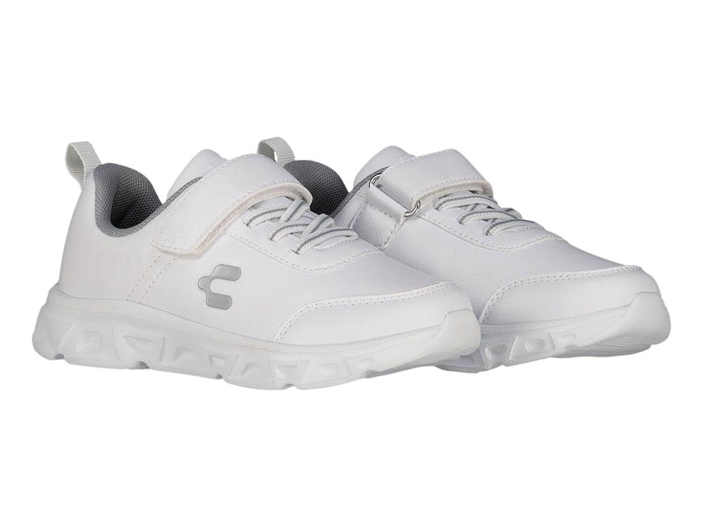 Tenis deportivos Charly color blanco para niño con cierre de velcro y suela blanca robusta.