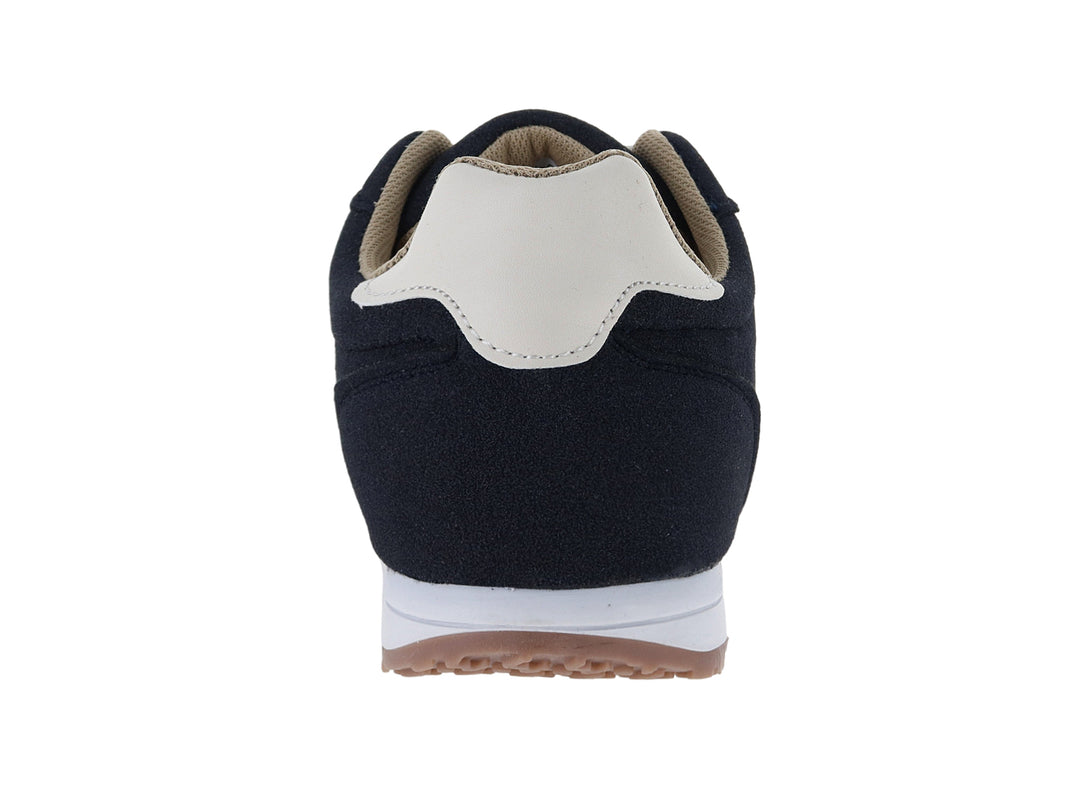 Tenis ATOK color marino con franjas laterales y suela color latte para mujer.
