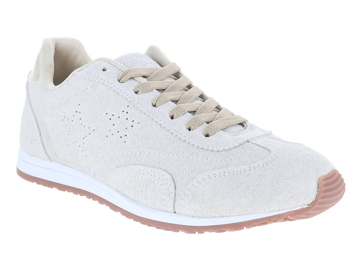 Tenis ATOK color hielo con suela blanca y detalle brillante en el talón.