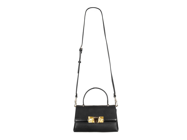 Bolsa negra Steve Madden con asa superior y broche metálico dorado.