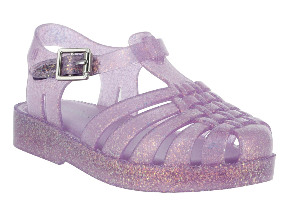 Sandalia morada con glitter para bebé de la marca Mini Melissa, con diseño calado y correa con hebilla.