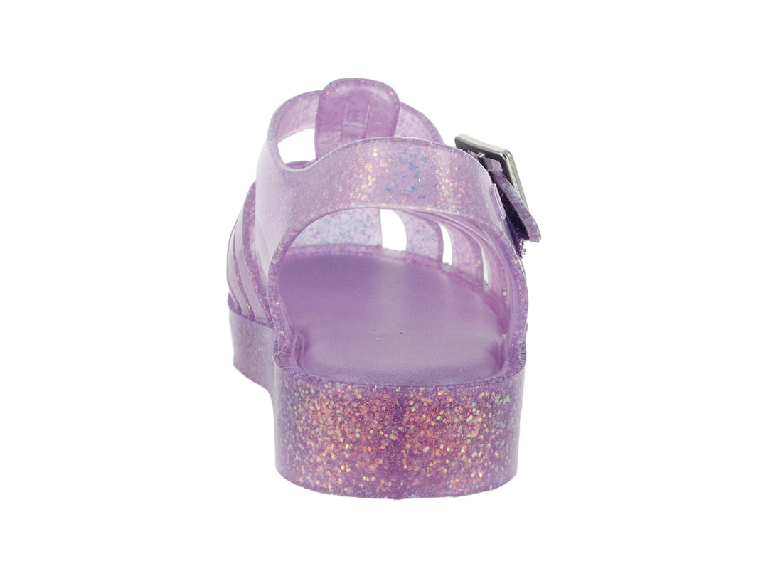 Sandalia morada con glitter para bebé de la marca Mini Melissa, con diseño calado y correa con hebilla.