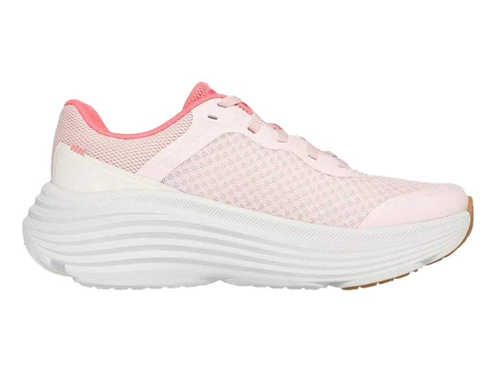 Tenis deportivos Skechers en color rosa y blanco con suela blanca ancha y base café.