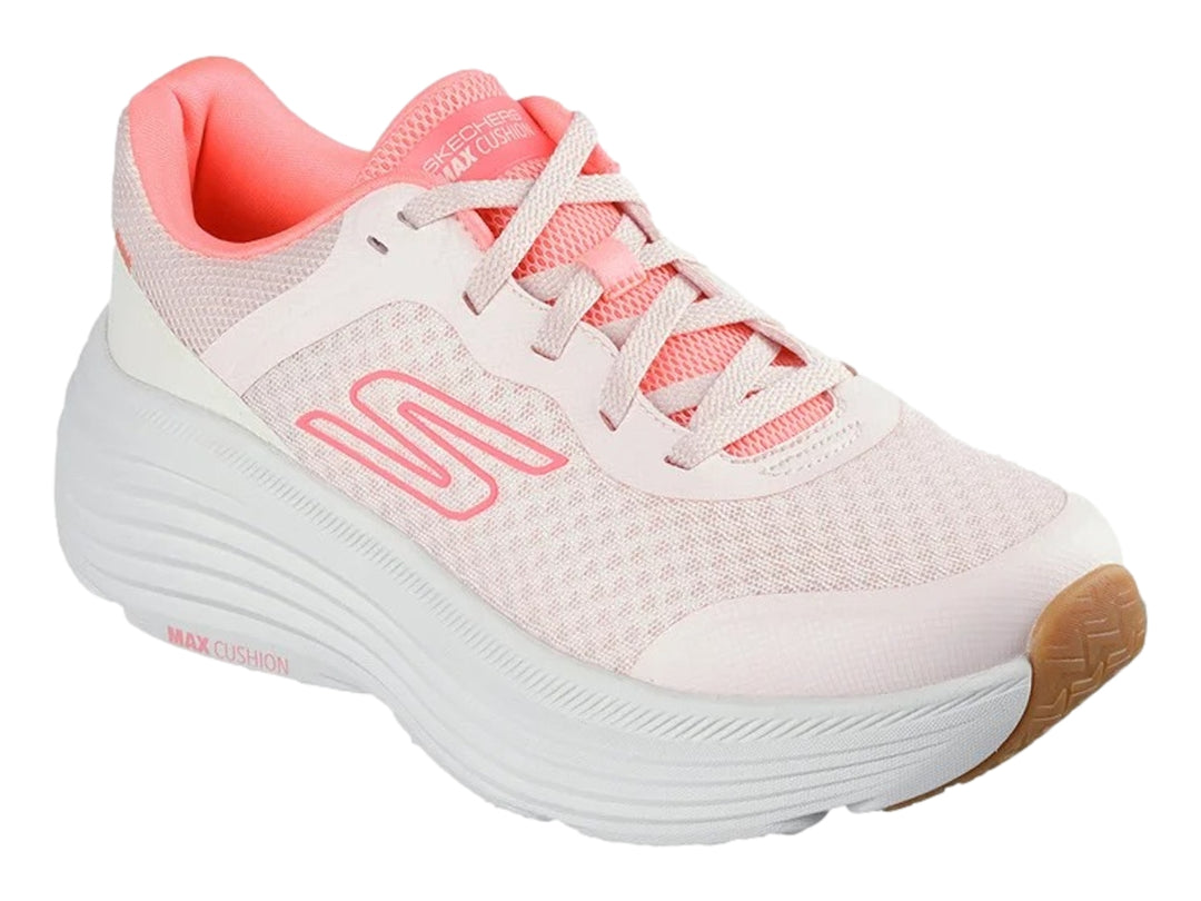 Tenis deportivos Skechers en color rosa y blanco con suela blanca ancha y base café.