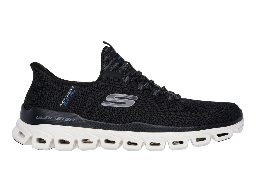 Tenis deportivos Skechers color negro con suela blanca Glide-Step para Hombre.