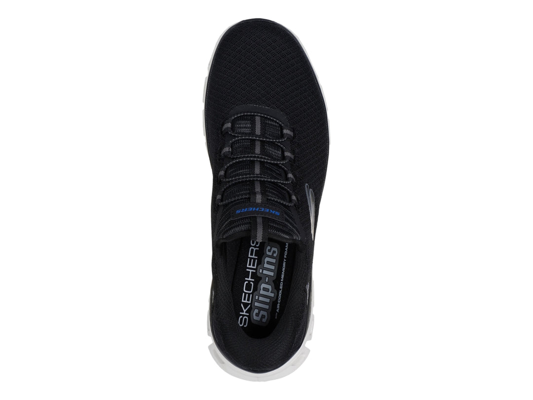 Tenis deportivos Skechers color negro con suela blanca Glide-Step para Hombre.
