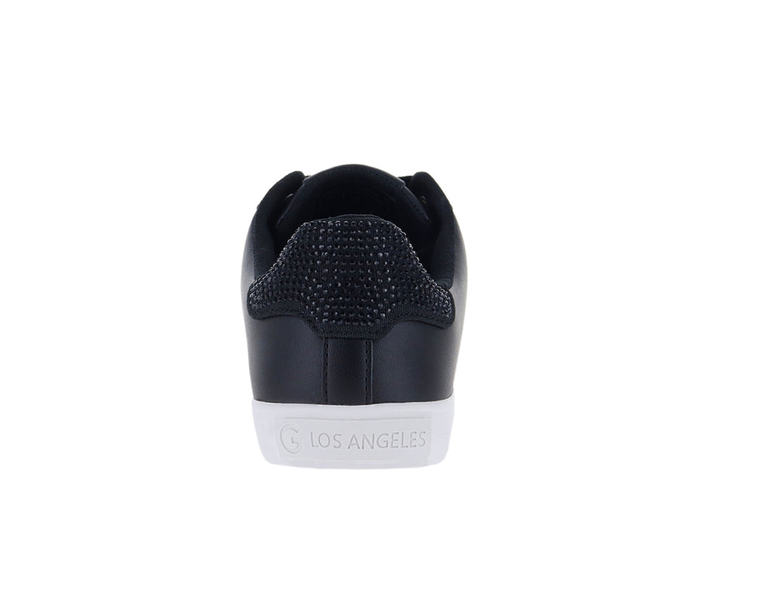 Tenis GBG color negro con suela blanca y detalles brillantes en el talón para mujer.