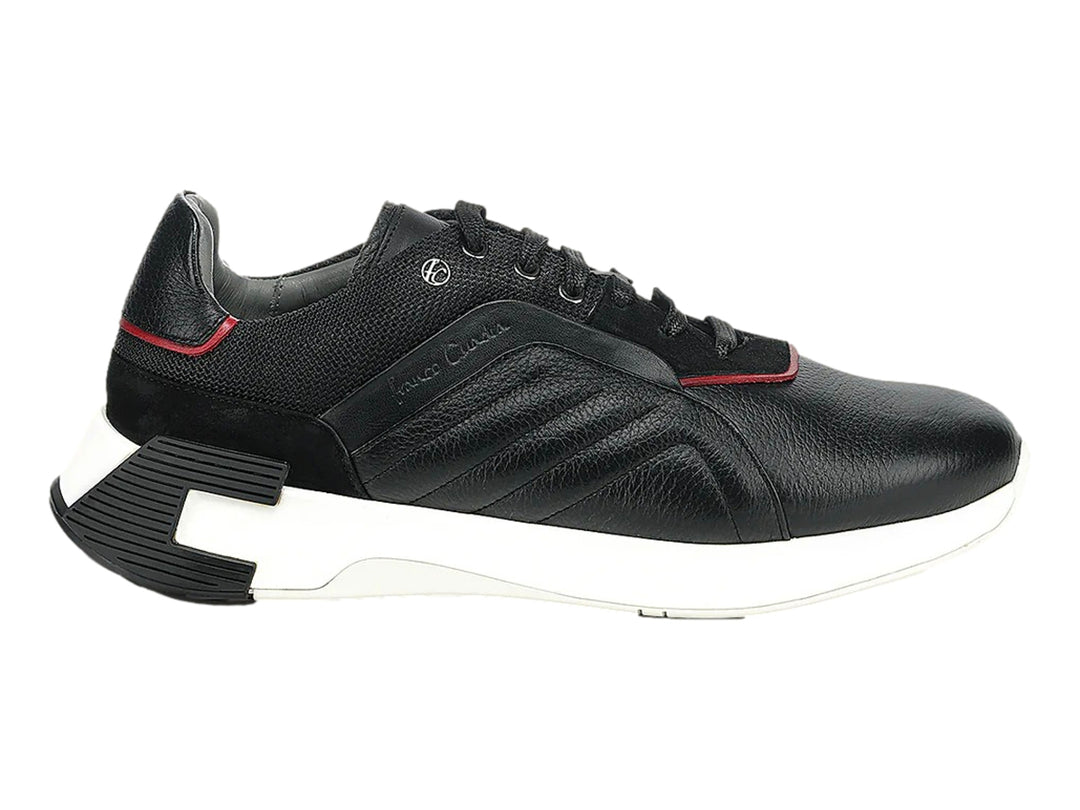 Tenis Cuadra de cuero negro con suela blanca y detalles rojos, vista lateral.