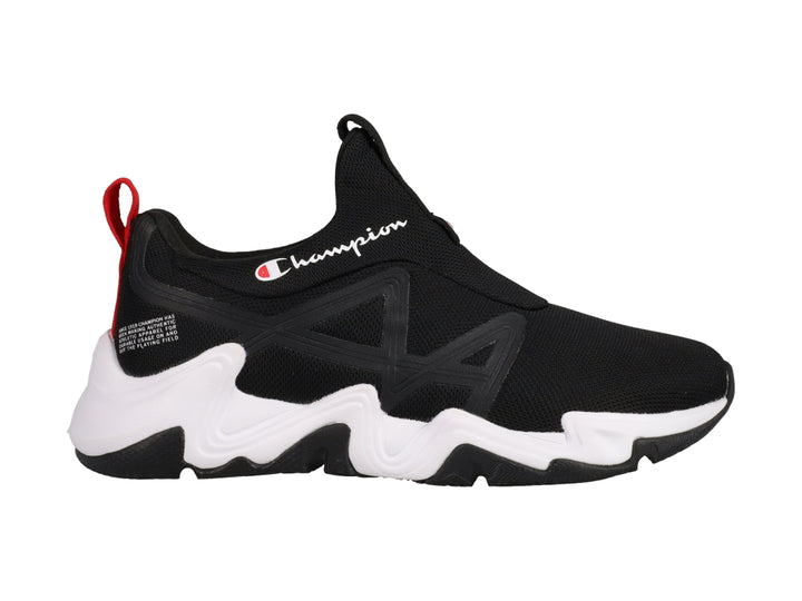 Tenis deportivos Champion color negro con suela blanca y detalle rojo en el talón, estilo slip-on.