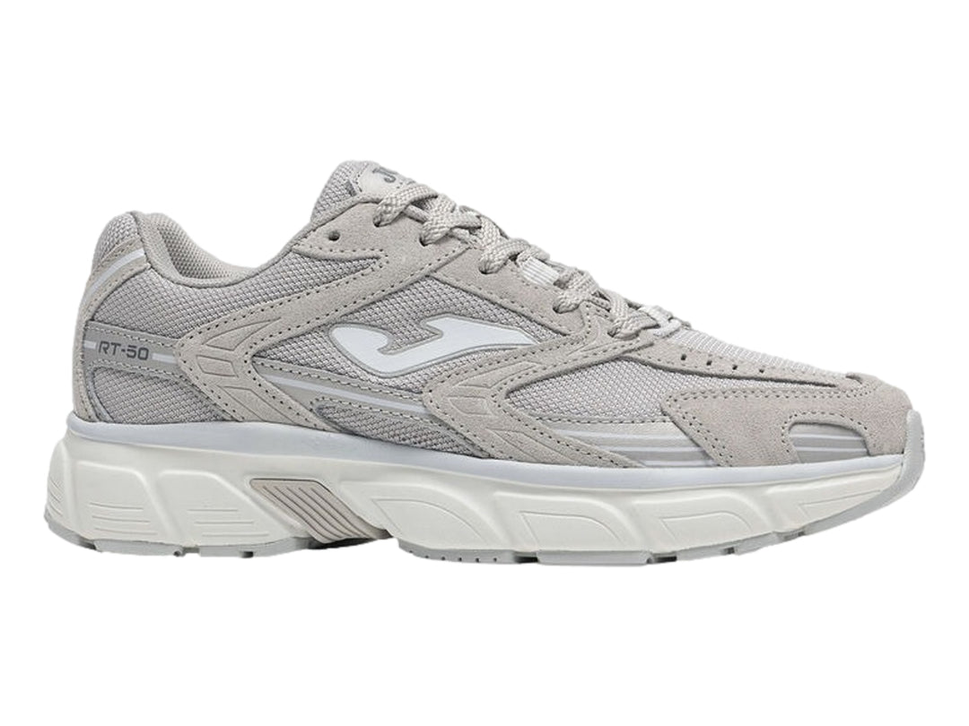 Tenis deportivos Joma modelo RT50 en color gris con detalles blancos y suela blanca robusta para mujer.
