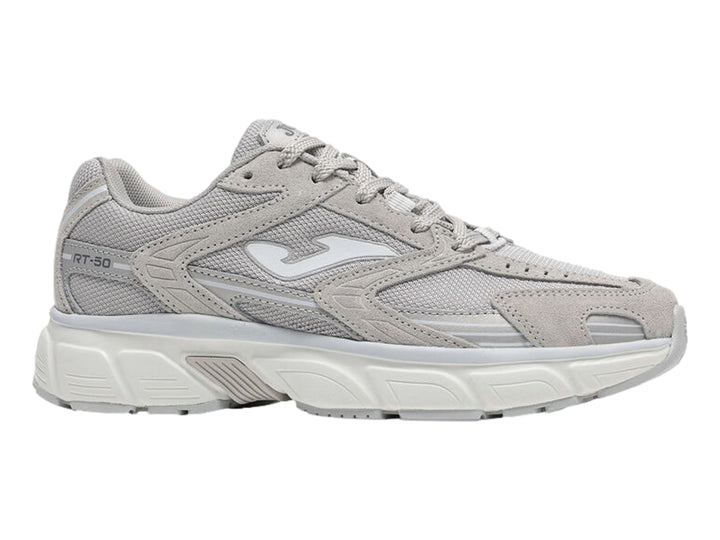 Tenis deportivos Joma modelo RT50 en color gris con detalles blancos y suela blanca robusta para mujer.