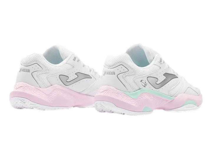Tenis deportivos Joma color blanco con detalles en rosa y verde menta en la suela.