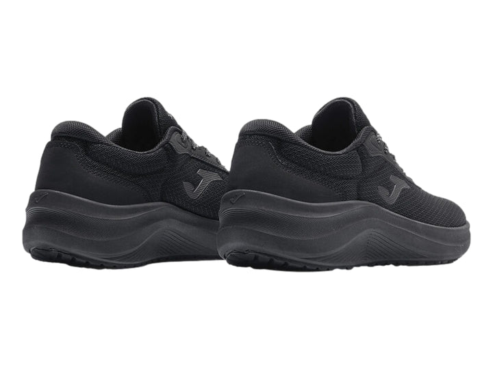Tenis deportivos Joma color negro con malla transpirable y suela gruesa.