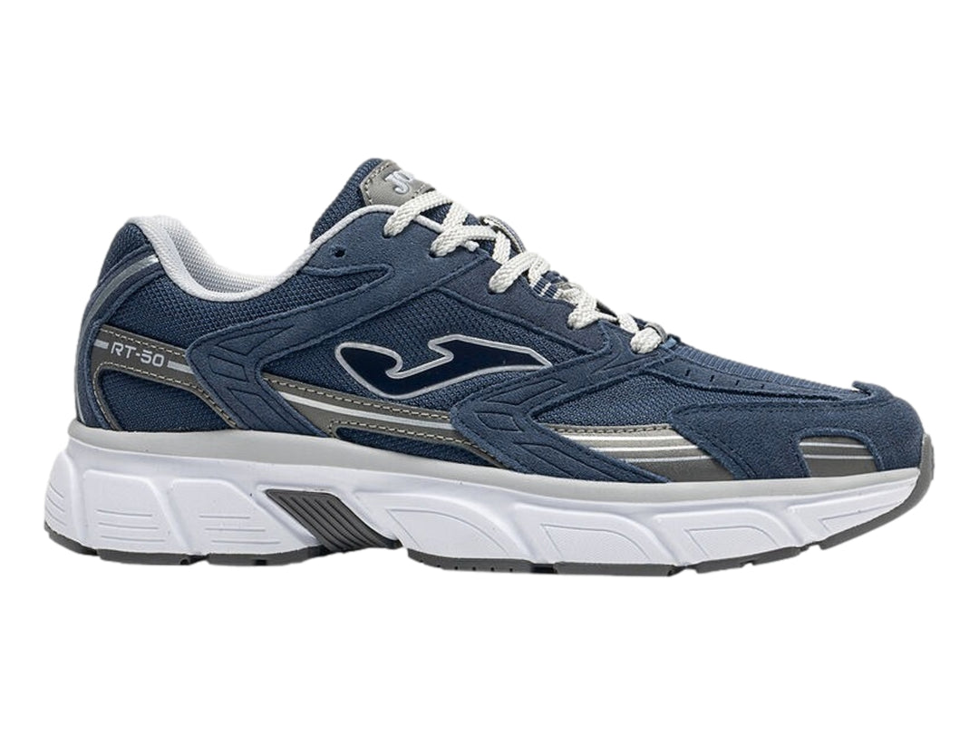 Tenis deportivos Joma color azul marino con suela blanca y detalles en gris.