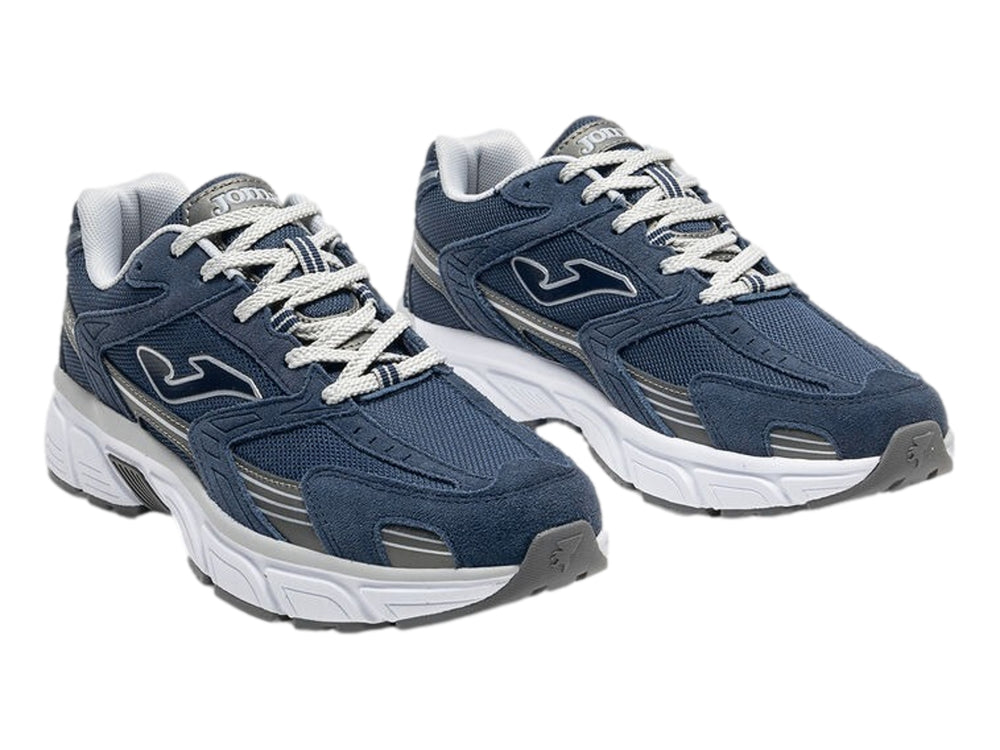 Tenis deportivos Joma color azul marino con suela blanca y detalles en gris.