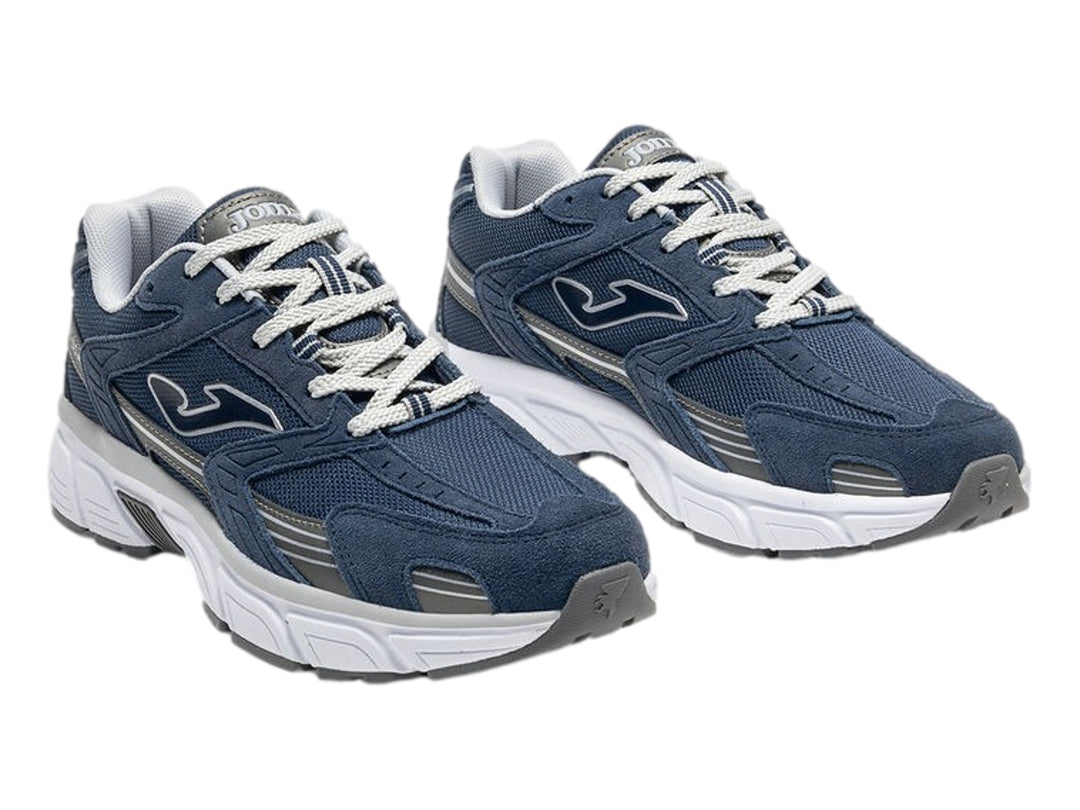 Tenis deportivos Joma color azul marino con suela blanca y detalles en gris.
