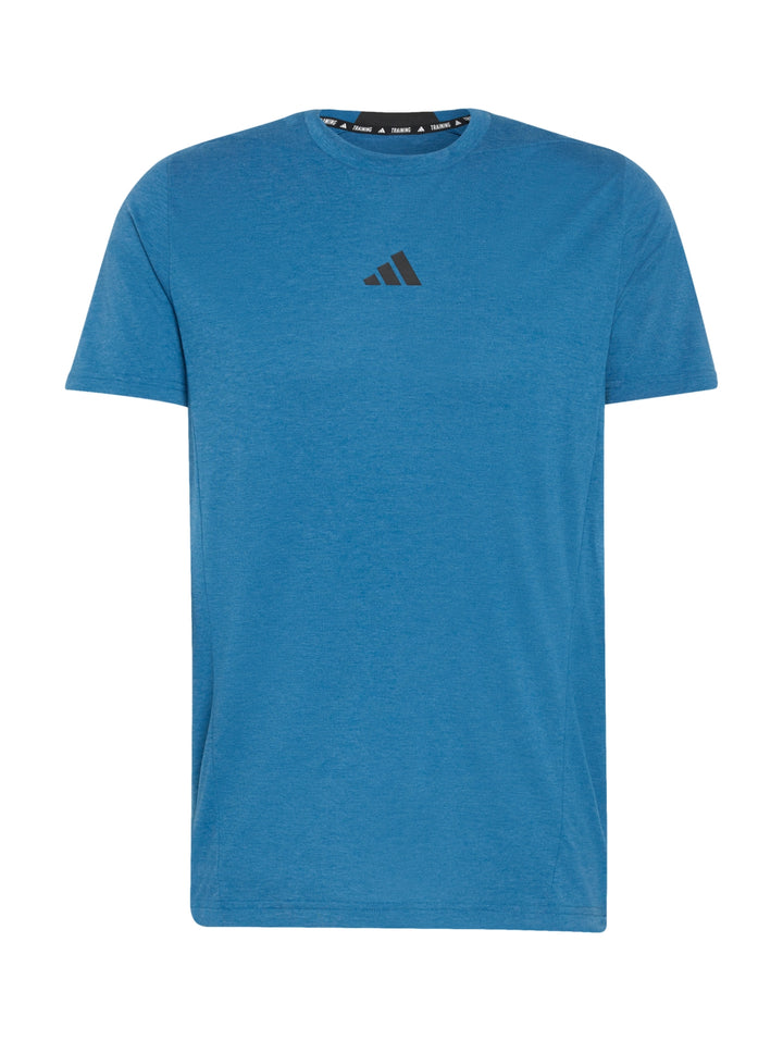 Camiseta deportiva Adidas de color azul con cuello redondo y manga corta.