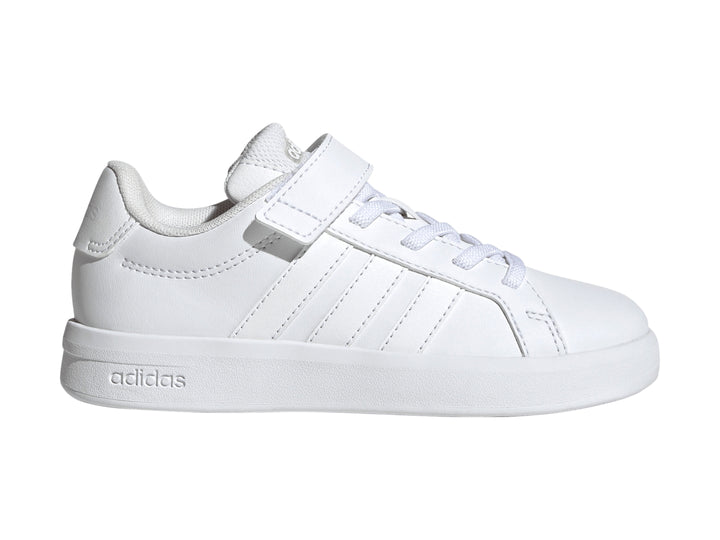 Tenis Adidas Grand Court 3.0 color blanco para niños con cierre de velcro y agujetas.