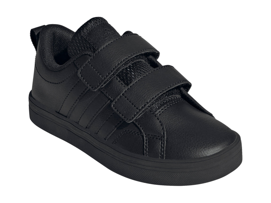 Tenis Adidas color negro con cierres de velcro y suela plana.