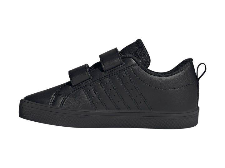 Tenis Adidas color negro con cierres de velcro y suela plana.
